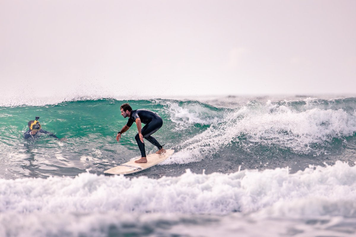 Surfer with a DRIFTER SIC MAUI surfboard