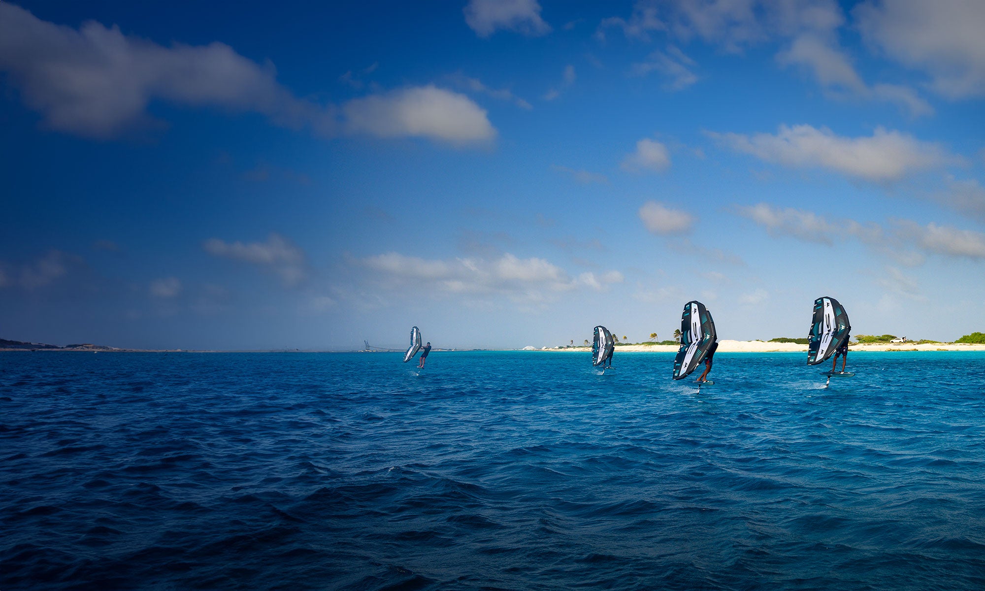 Wingfoilers on the ocean with SIC MAUI wings Dragon