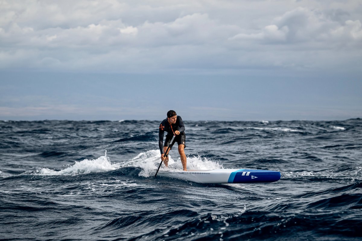 Athlete in action on a SIC Maui stand up paddleboard 