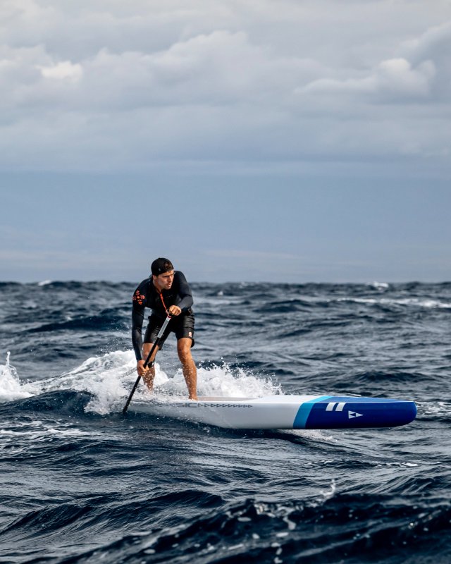 Athlete in action on a SIC Maui stand up paddleboard 