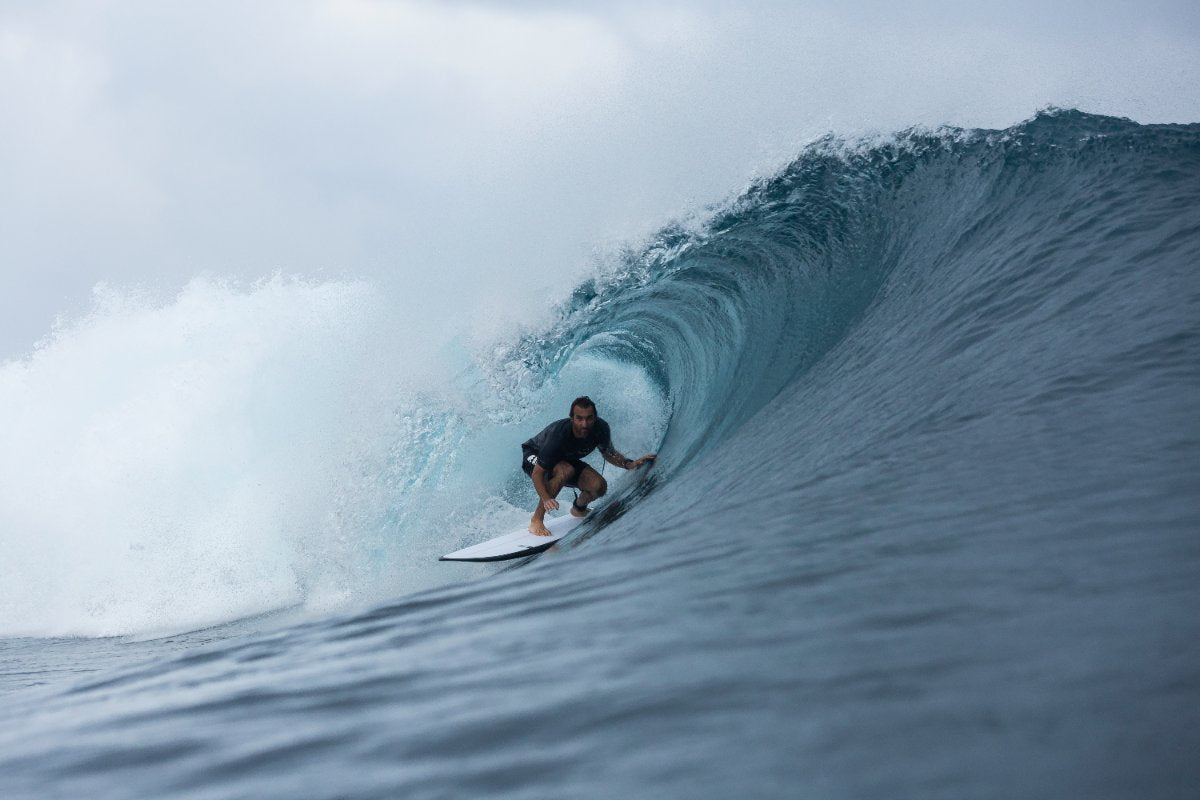 Joan duru in teahupoo spot on a pick pocket surfboard SIC MAUI
